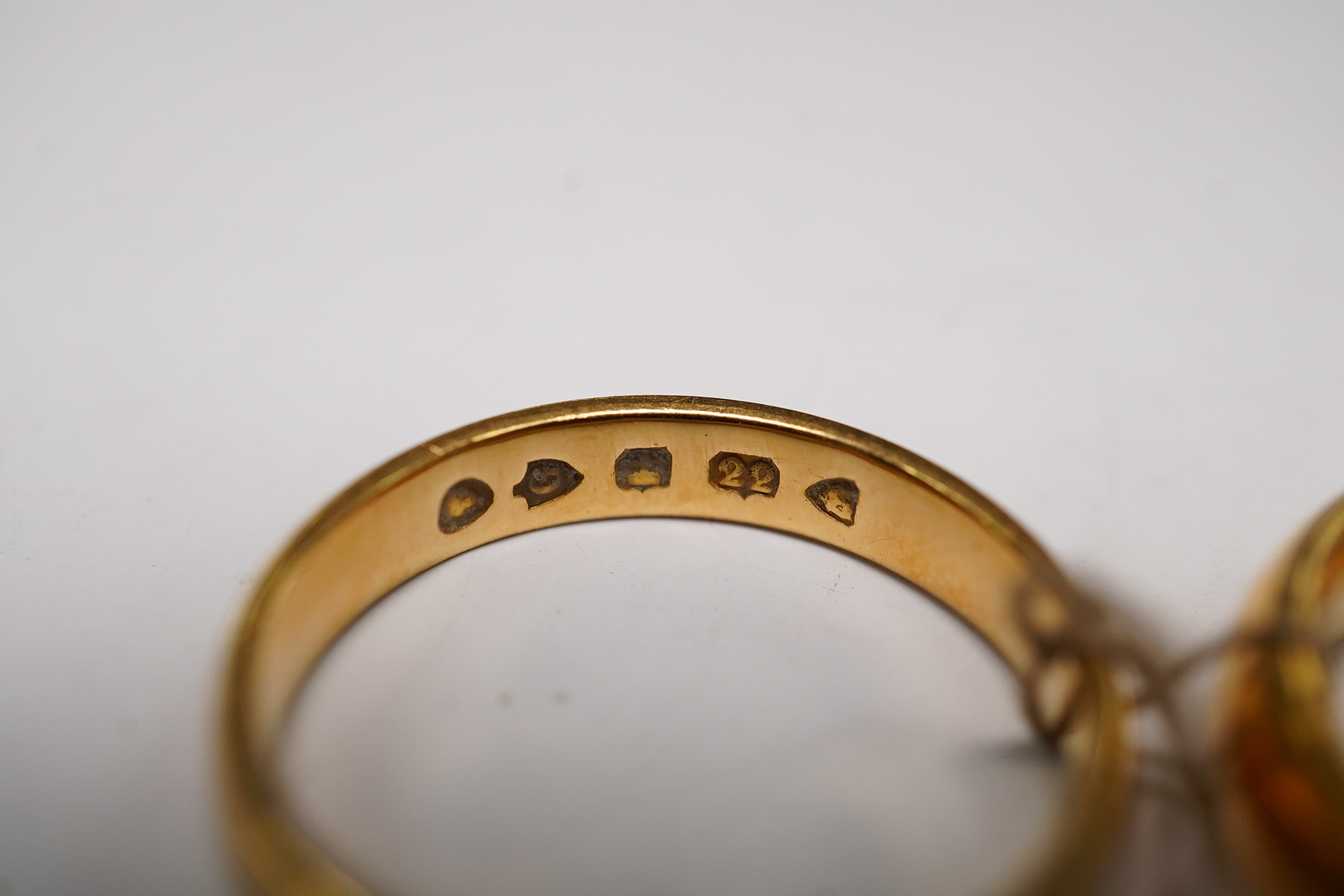 Two 22ct gold wedding bands, K/L & L, 10.3 grams. Condition - fair